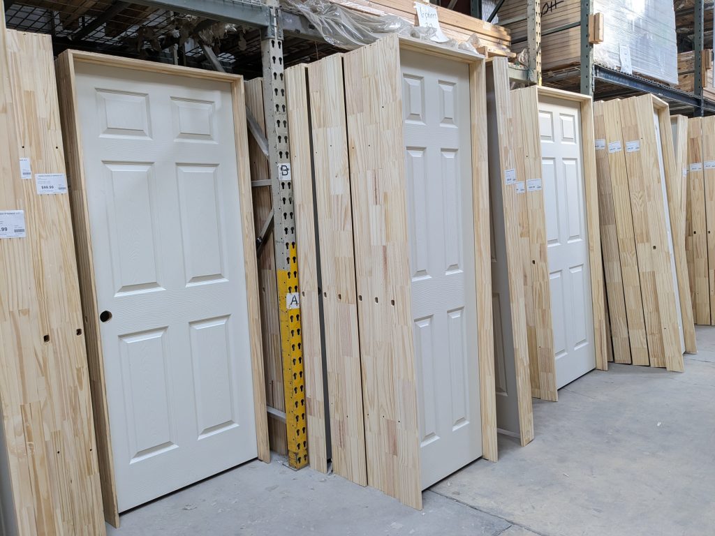 white wooden door with frame