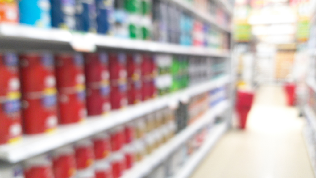A shop with paints on shelves